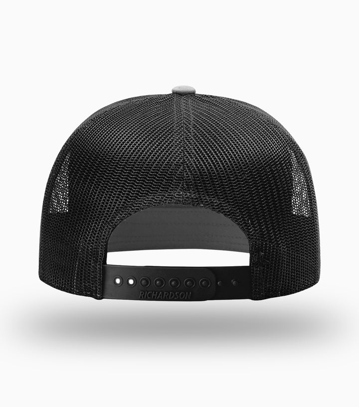 UNBOUND FORCE // 7-Panel Trucker